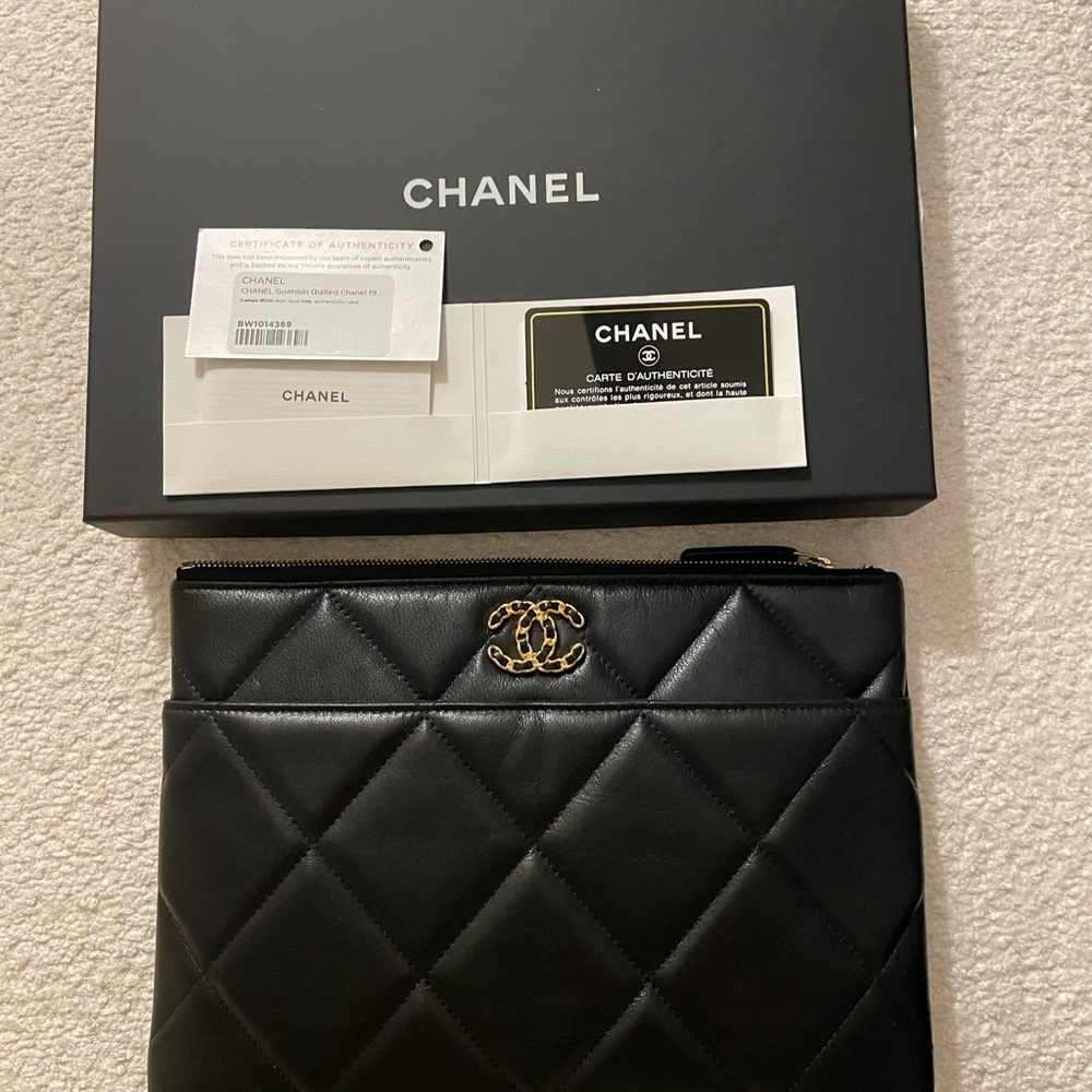 CHANEL Black and Gold Zippered Pouch